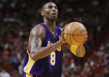 MIAMI - DECEMBER 25:  Kobe Bryant #8 of the Los Angeles Lakers shoots a free throw against the Miami Heat during the game at American Airlines Arena on December 25, 2005 in Miami, Florida.  The Heat won 97-92.  NOTE TO USER: User expressly acknowledges and agrees that, by downloading and/or using this Photograph, User is consenting to the terms and conditions of the Getty Images License Agreement.  (Photo by Eliot J. Schechter/Getty Images)