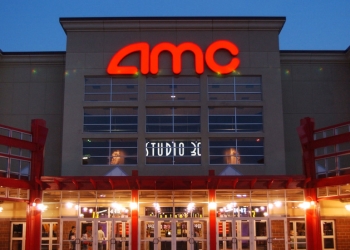 Mandatory Credit: Photo by Orlin Wagner/AP/Shutterstock (5768491a)
People enter AMC's Studio 30 theater
AMC Theatres Odeon and UCI, Olathe, Kansas, USA - 11 May 2005
AMC Theatres is buying European movie theater operator Odeon & UCI Cinemas Group in a deal valued at about 921 million pounds ($1.21 billion). AMC says, Tuesday, July 12, 2016,  that the transaction will make it the biggest movie theater operator in the world. Odeon & UCI has 242 theaters in Europe. The deal will give AMC a total of 627 theaters in eight countries.
