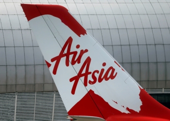 FILE PHOTO: Tail of AirAsia X plane as seen at the Garuda Maintenance Facility AeroAsia in Tangerang, Indonesia, September 20, 2017. Picture taken September 20, 2017. REUTERS/Beawiharta/File Photo