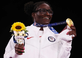 CHIBA, JAPAN - AUGUST 03:  Gold medalist Tamyra Marianna Stock Mensah of Team United States poses with the gold medal during the Women's Freestyle 68kg medal ceremony on day eleven of the Tokyo 2020 Olympic Games at Makuhari Messe Hall on August 03, 2021 in Chiba, Japan. (Photo by Tom Pennington/Getty Images)